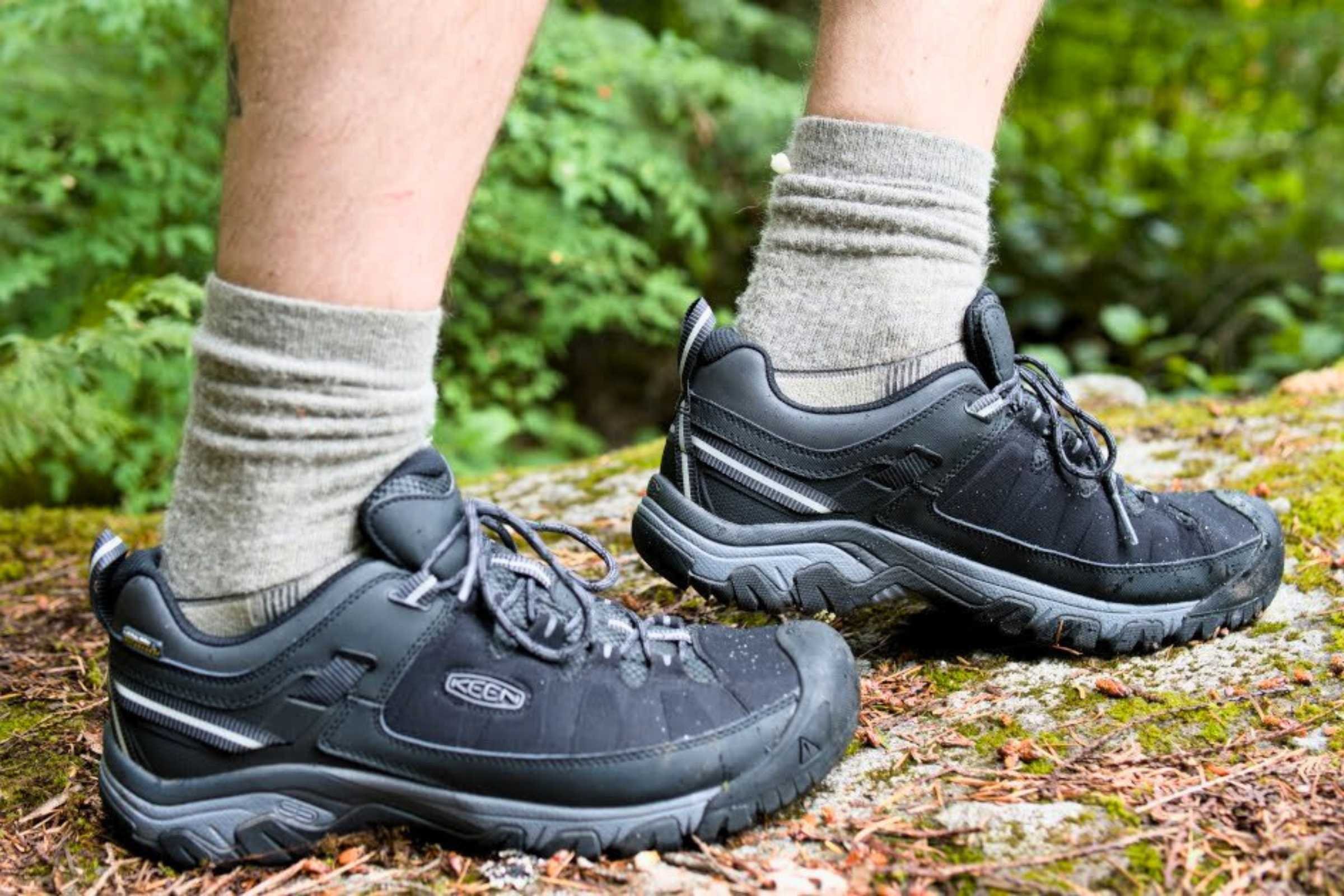 The KEEN Targhee hiking shoe demonstrated on a rocky trail.
