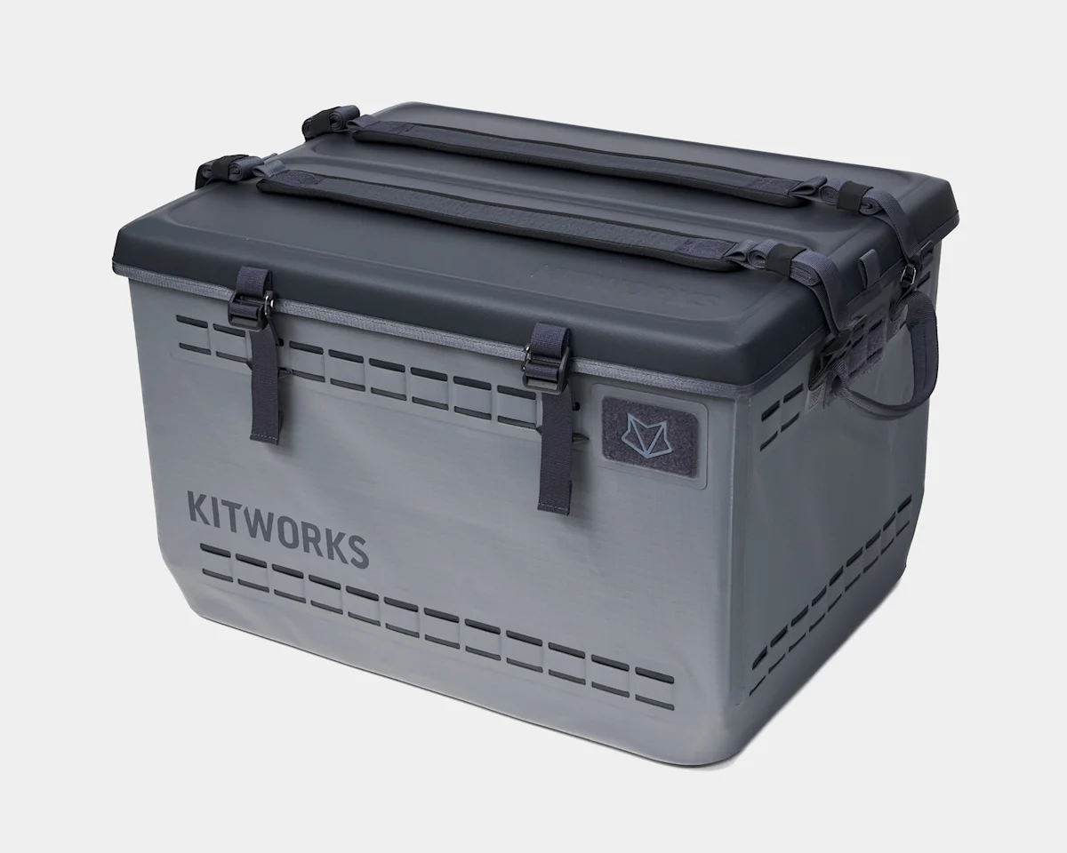 Close-up of a rugged HDPE modular gear bin with heavy-duty latches.