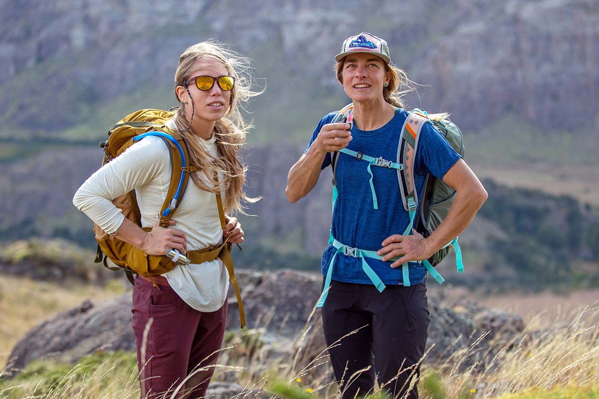 Comparative view of REI Co-op Trail 40 and Osprey Hikelite women's daypacks.