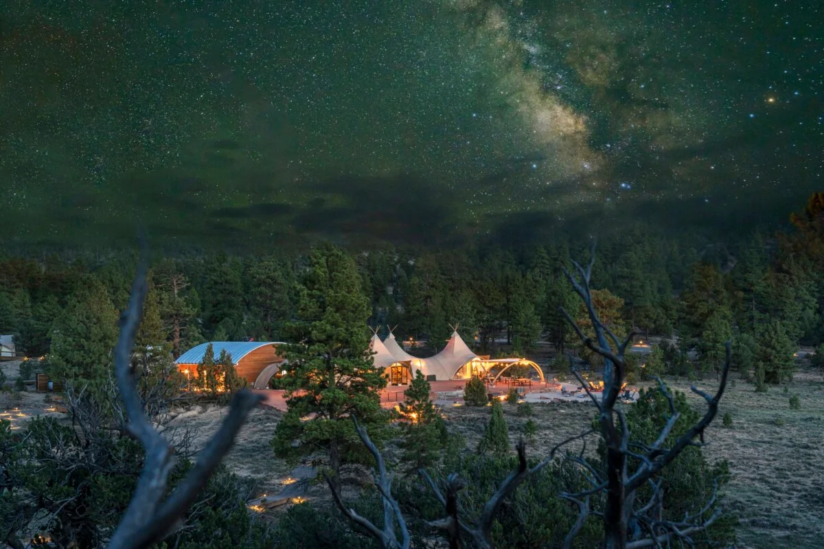 Luxury glamping tents at Under Canvas Bryce Canyon under a starry sky.