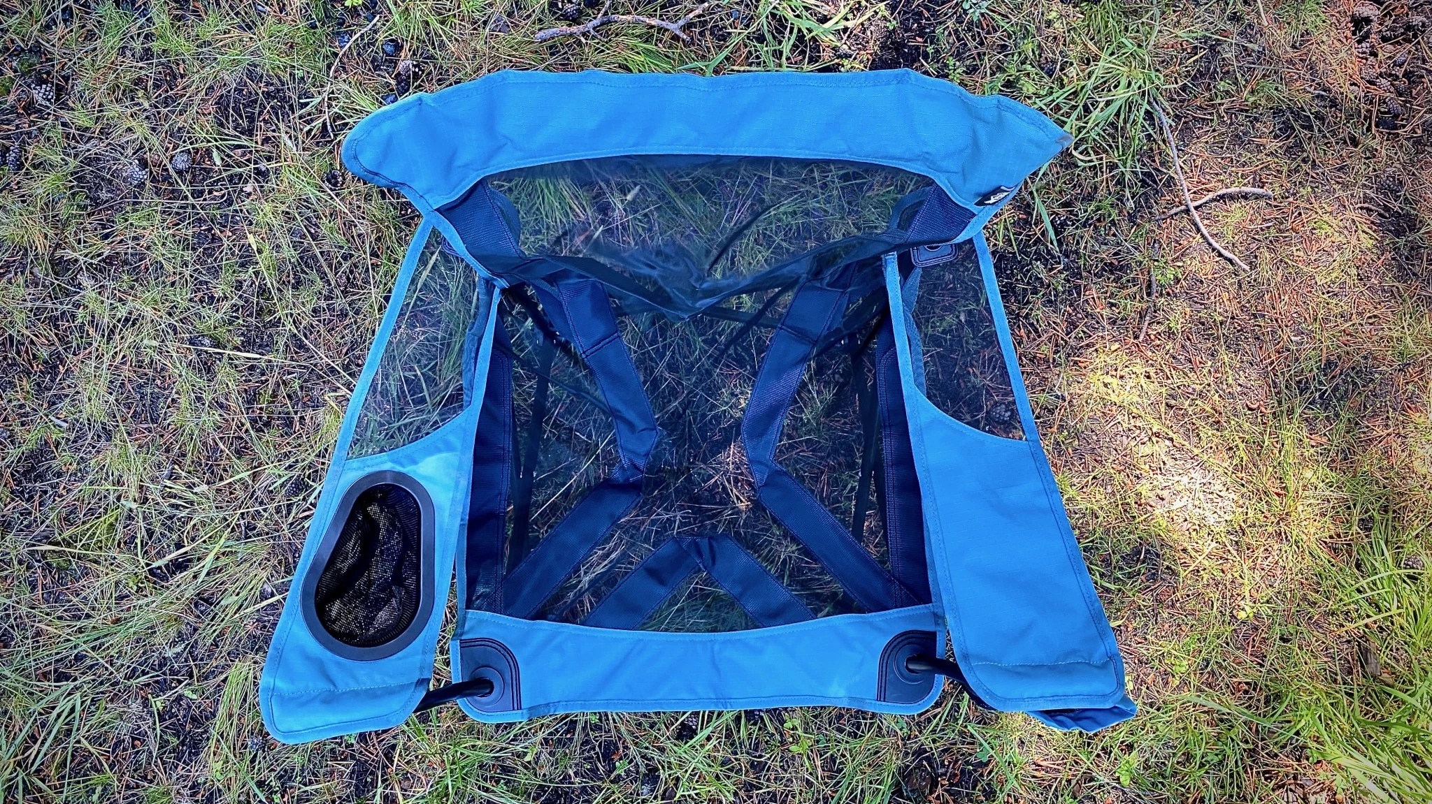 A side-by-side comparison of a traditional folding camping chair and a packable collapsible chair.