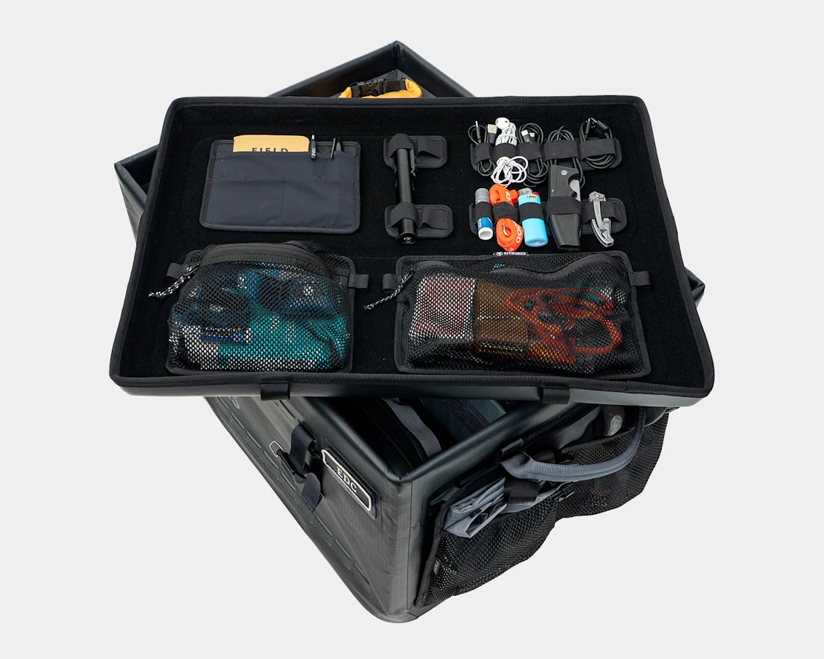 Top-down view of internal dividers and organizers within a technical gear bin.