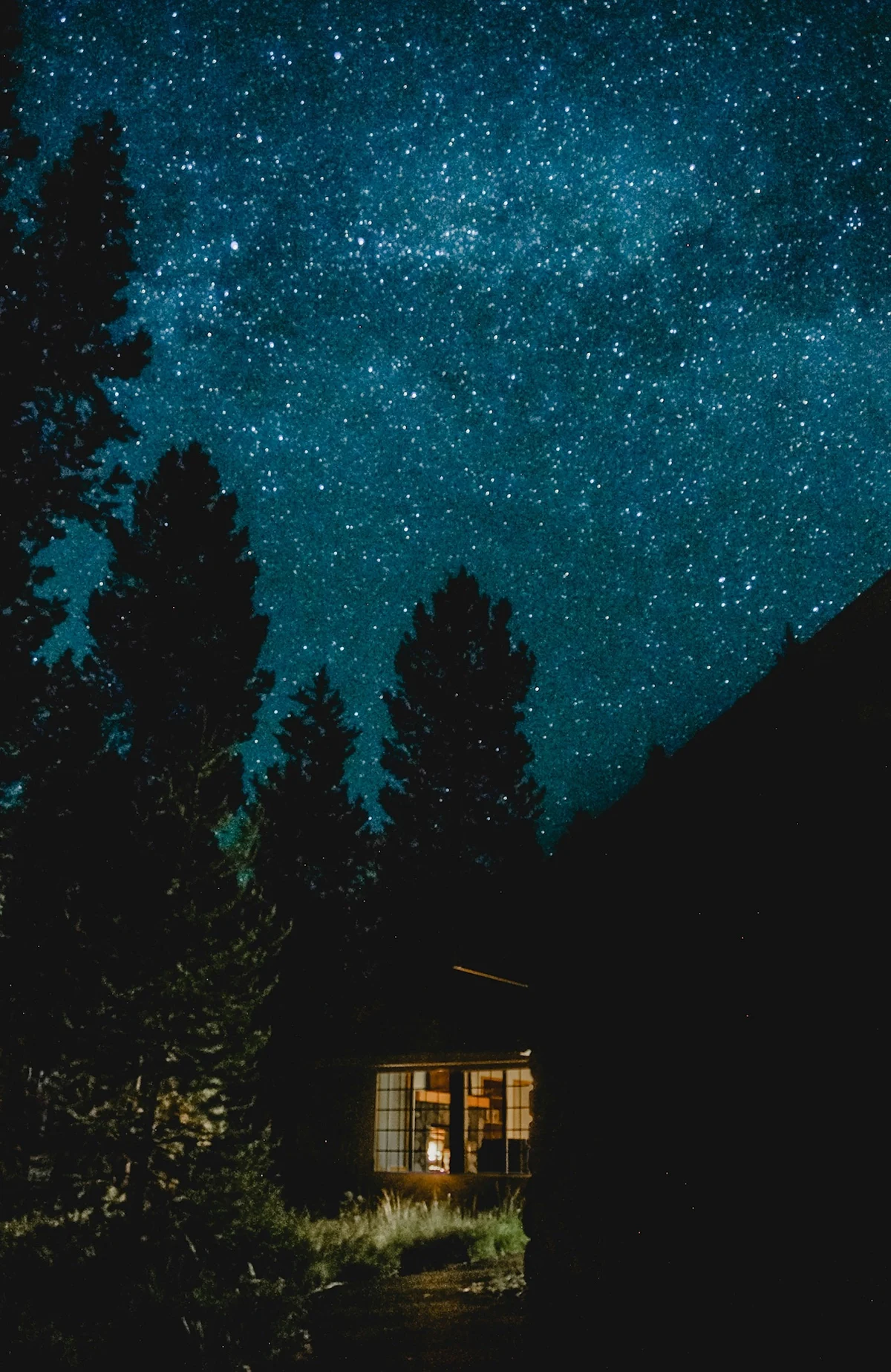 The Milky Way visible over a rugged Oregon landscape.