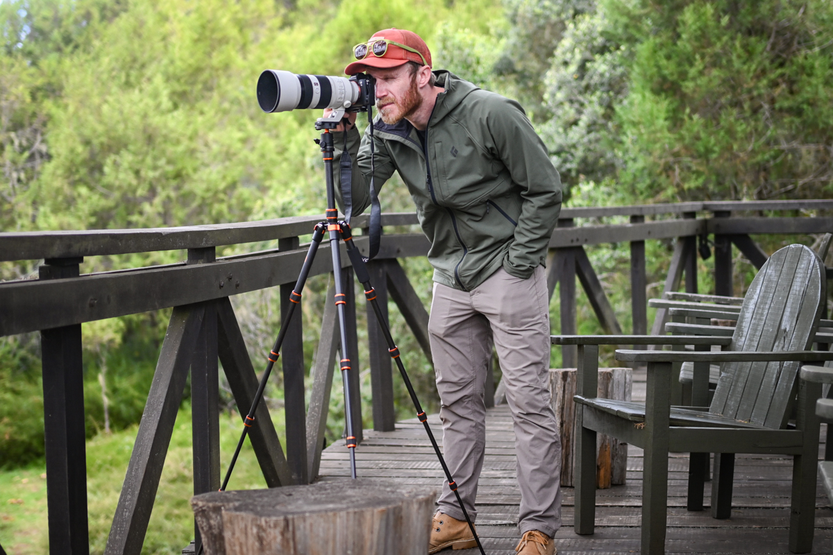 A traveler testing technical clothing on a safari in Kenya.