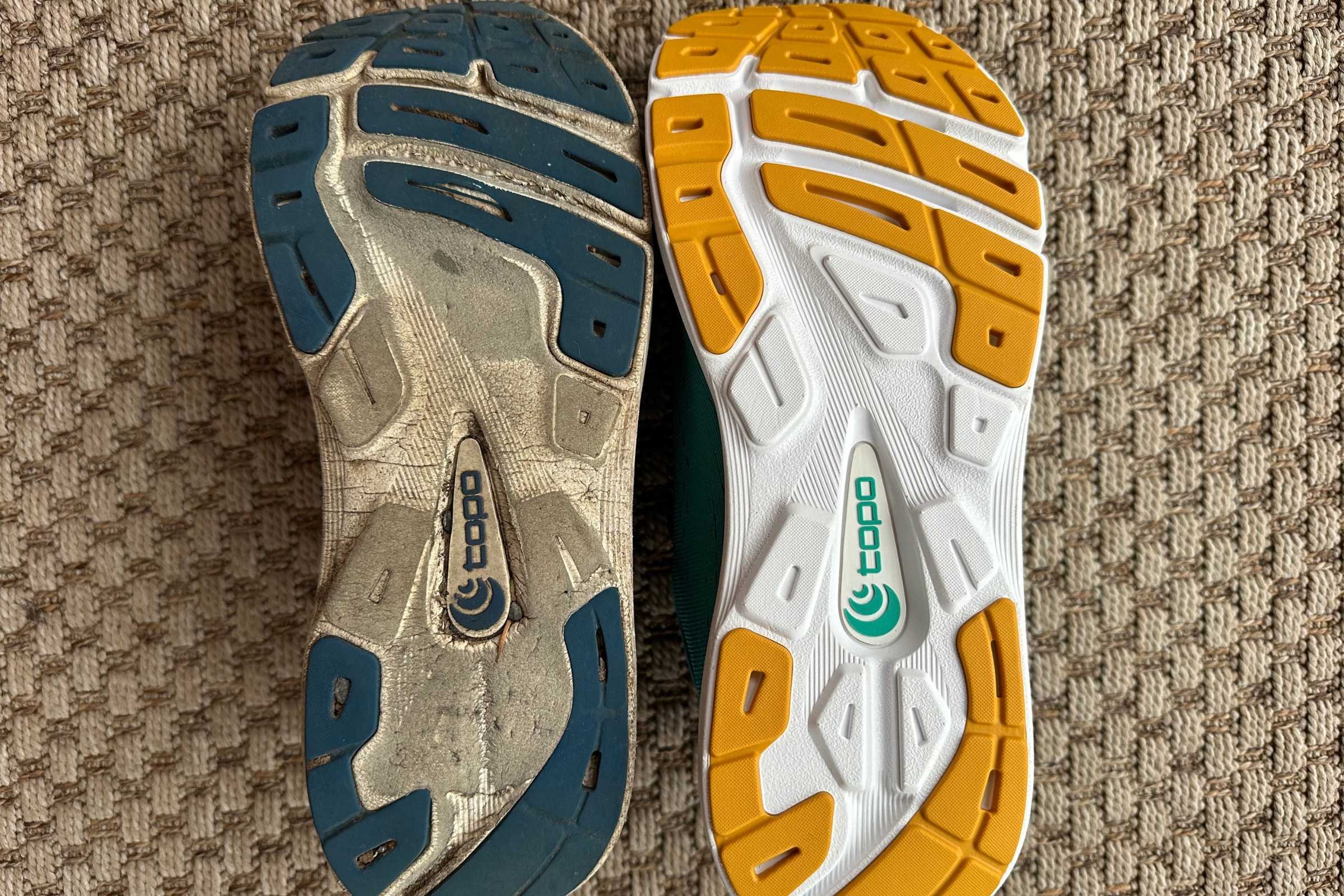 Side-by-side comparison of a worn Topo Magnifly 5 outsole with 700 miles and a brand new outsole.