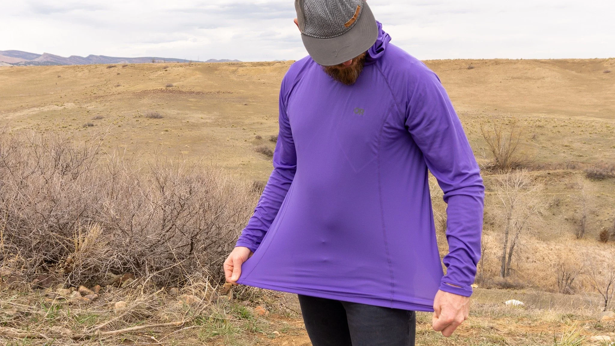 Close-up of thin, stretchy, and air-permeable fabric from a technical sun shirt.