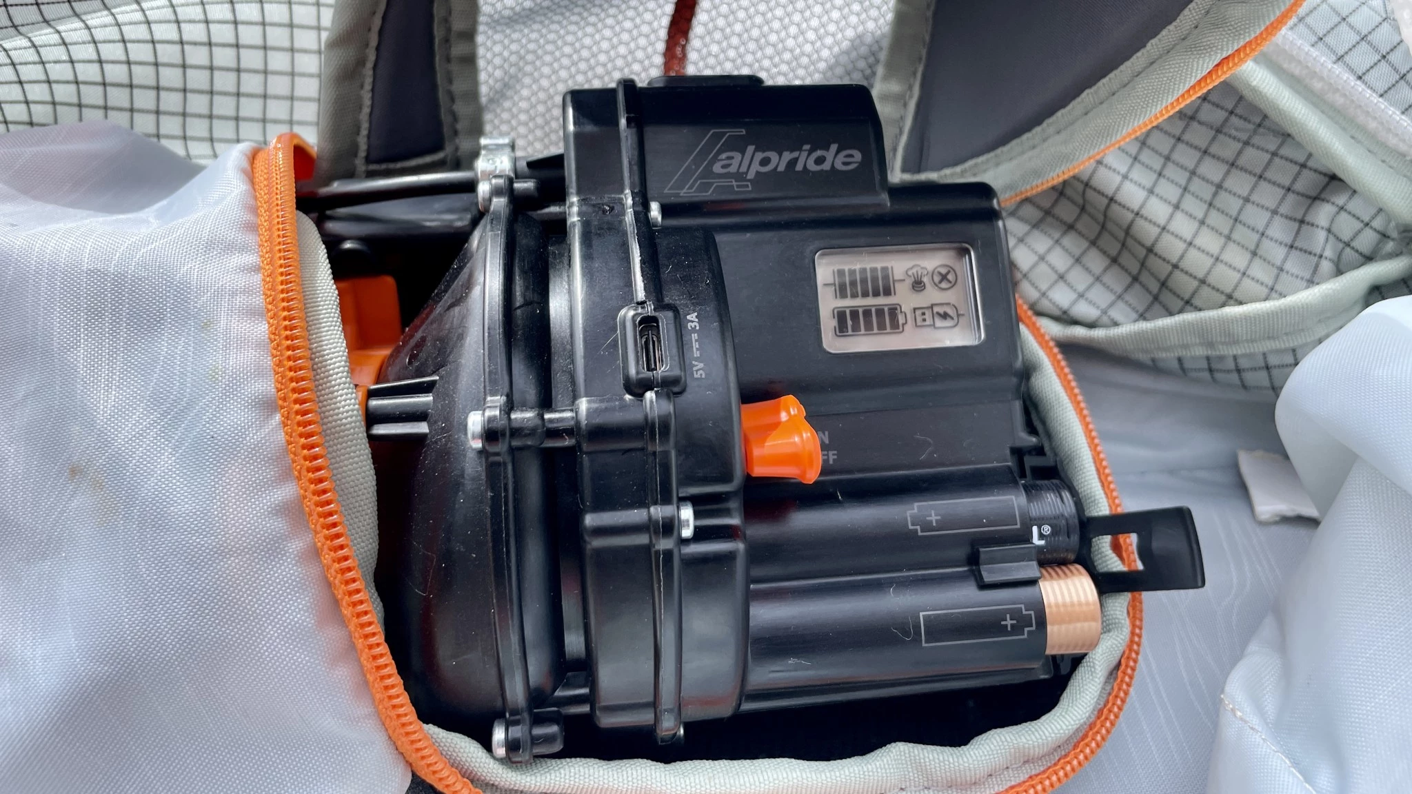 The internal battery and supercapacitor housing of an Alpride E2 avalanche airbag system.