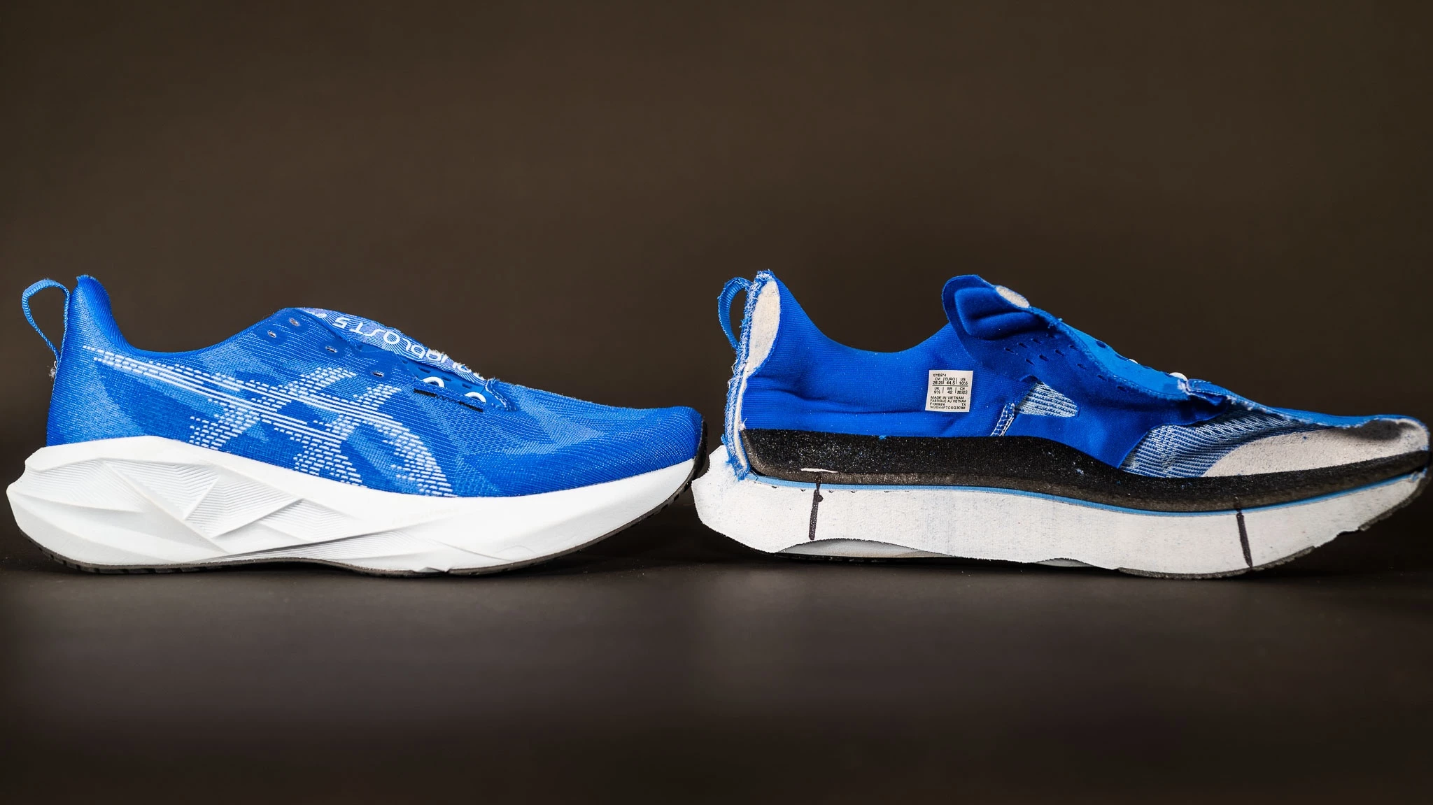 Side view of the Asics Novablast 5 highlighting its thick, max-cushion foam midsole.