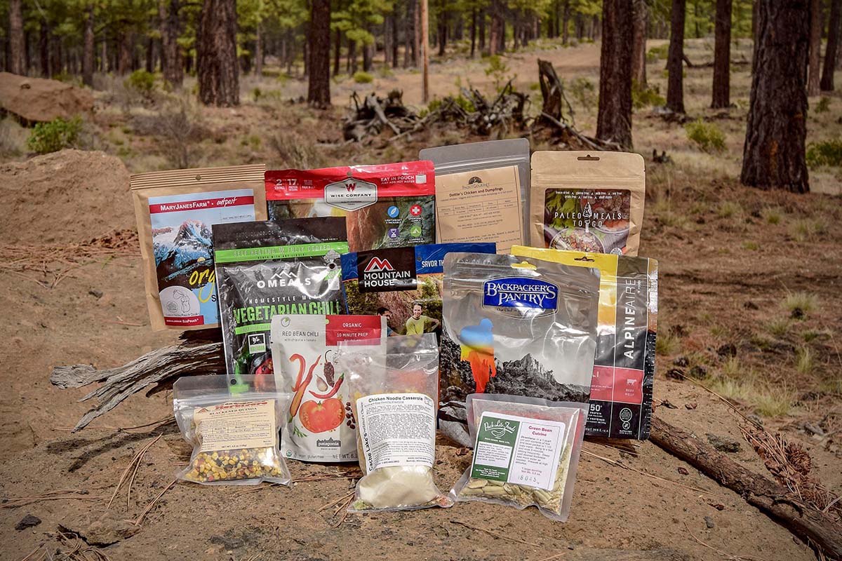 A group photo showing several different brands of freeze-dried and dehydrated backpacking meals.