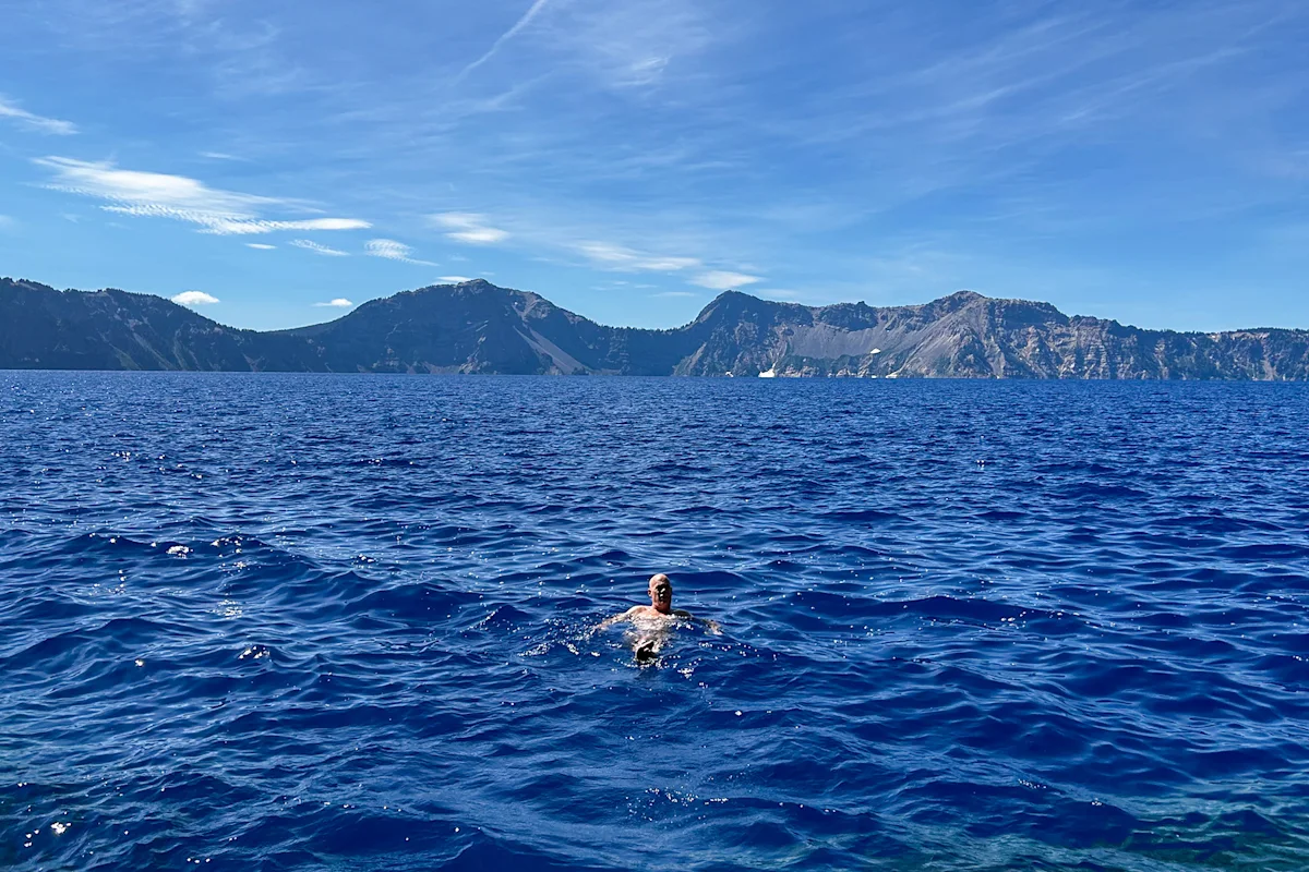 Panoramic view of the Cascade Range encircling the caldera of Crater Lake.