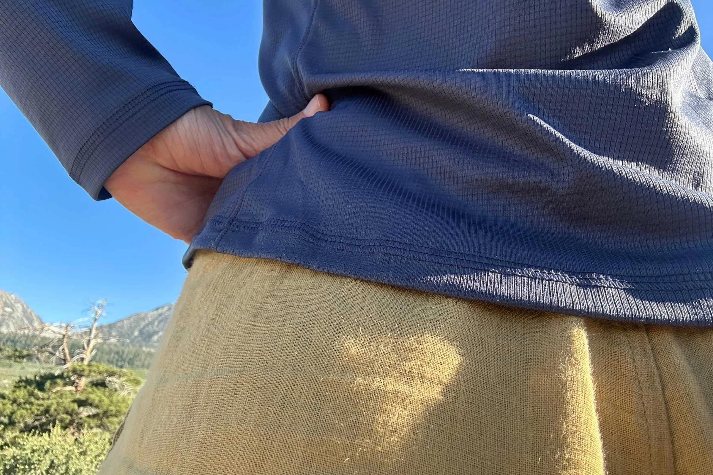 Extreme close-up of the textured microgrid fabric of the REI Flash Shade hoodie.