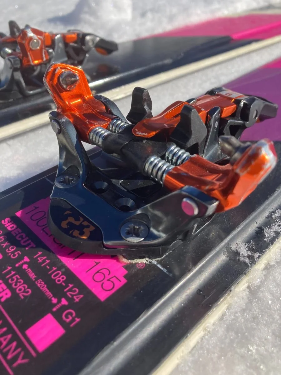 A macro shot of a G3 Ion 12 technical pin binding on a ski toe piece.