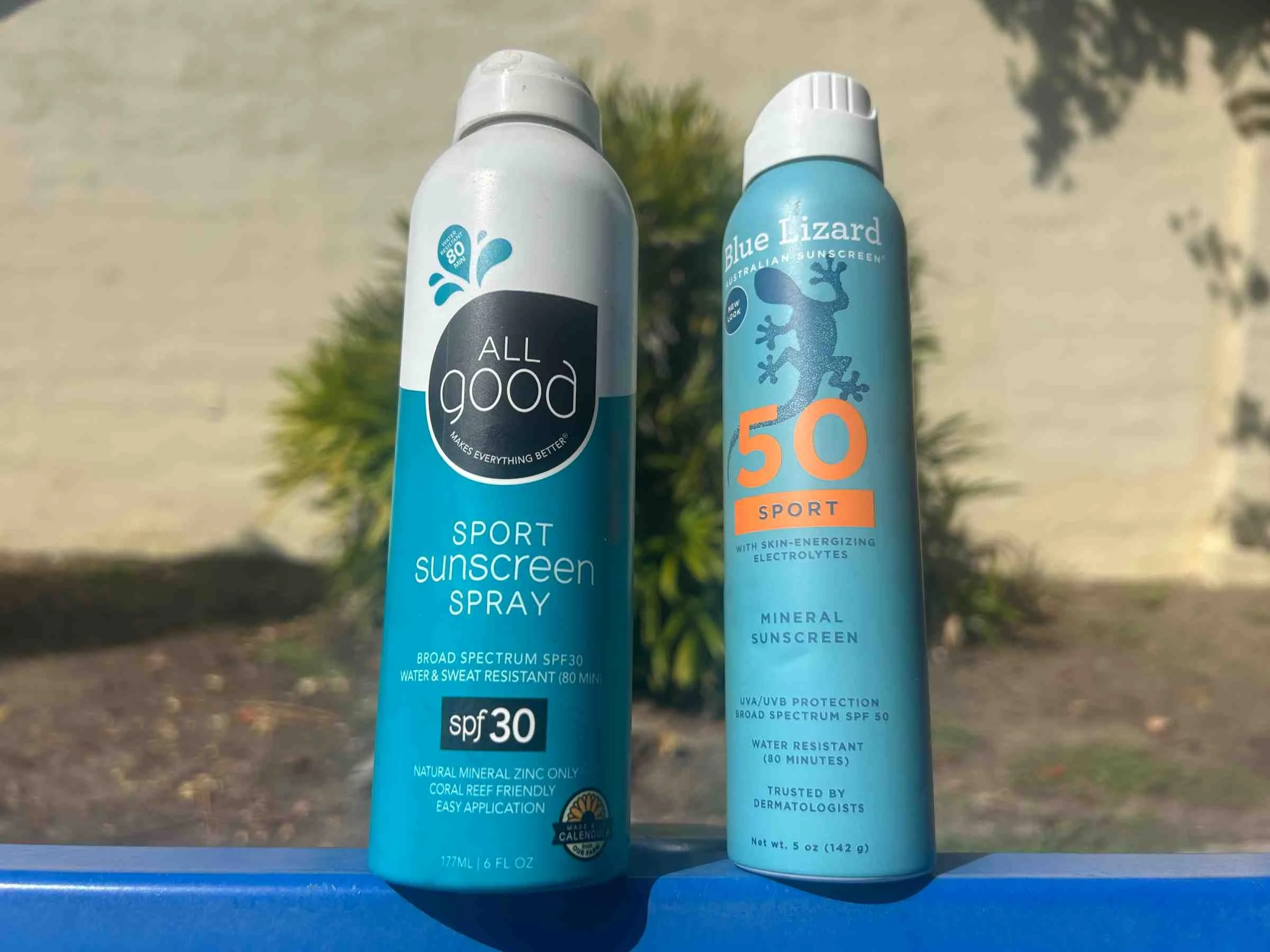 Comparing the spray nozzles of Allgood Sport and Blue Lizard mineral sunscreens.