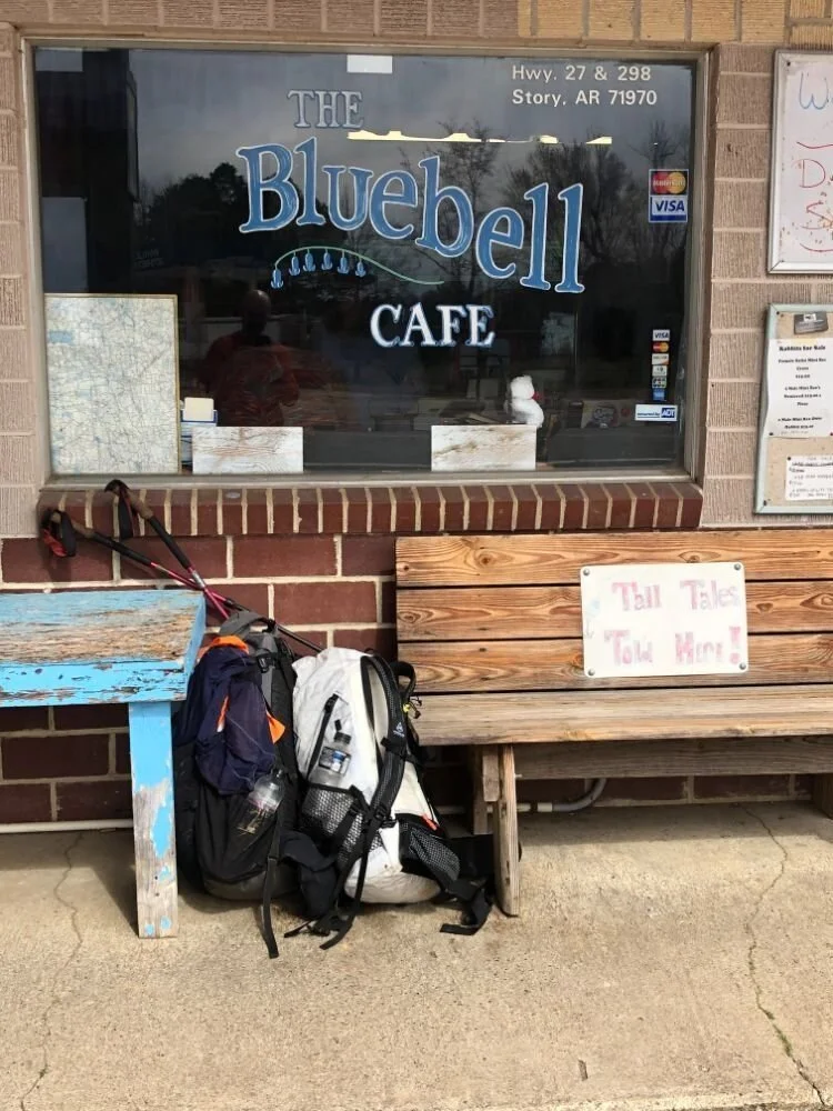 The exterior storefront of the Bluebell Cafe and Market in Story, Arkansas.