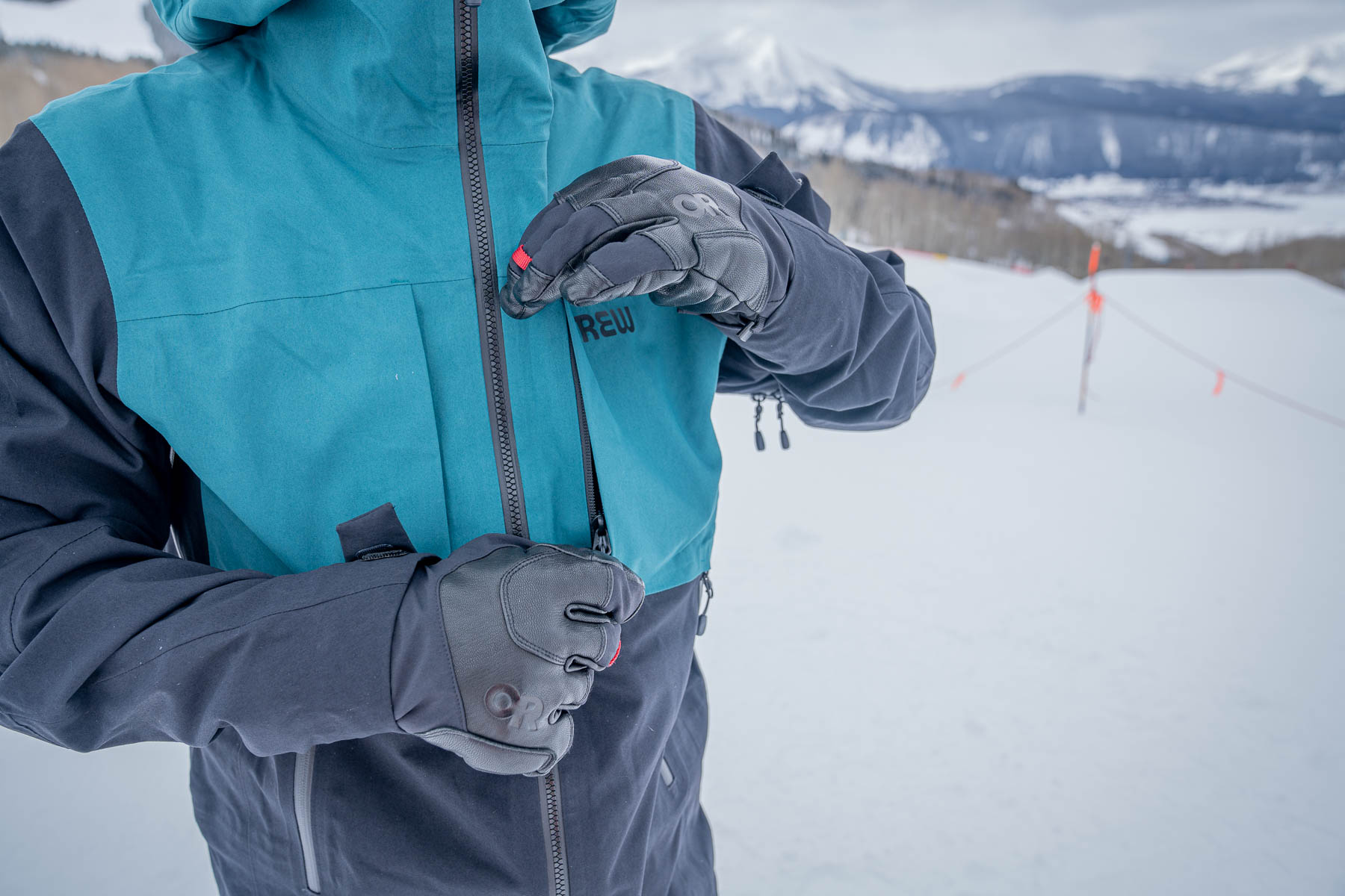 Close-up of a tester in Crested Butte during a blizzard with snow-covered gear.