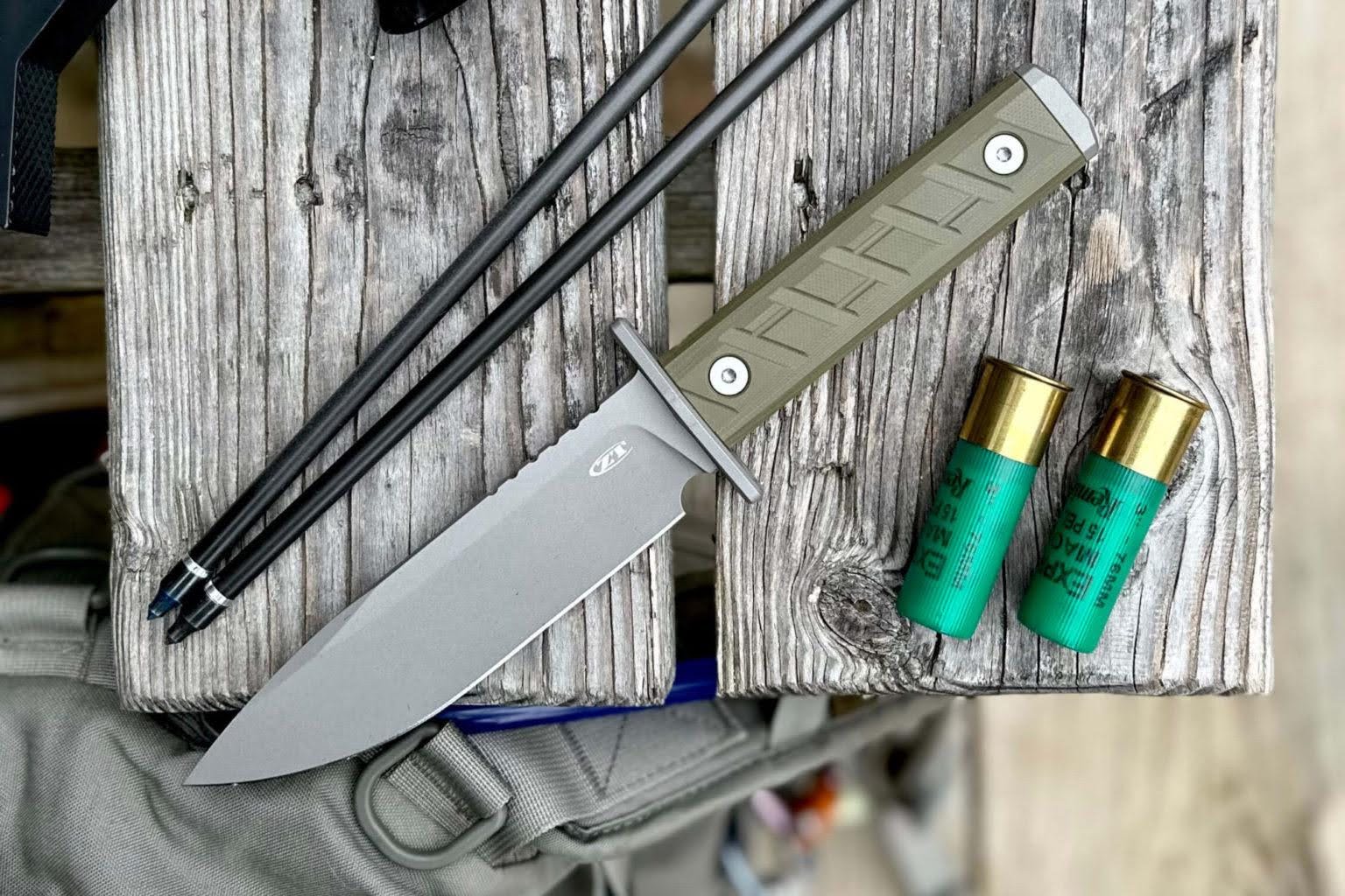 A Zero Tolerance 0006 knife being held in an outdoor environment.